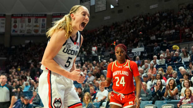 Nov 16, 2023; Storrs, Connecticut, USA; Connecticut Huskies guard Paige Bueckers (5) reacts to making a defensive play against the Maryland Terrapins during the first half at Harry A. Gampel Pavilion.